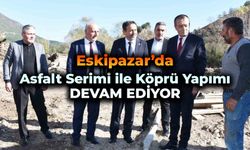 Eskipazar’da asfalt serimi ile köprü yapımı çalışmaları devam ediyor