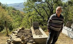 Mezarı kazıp tahtaları kıran ayı cenazeye ulaşamadan kaçtı