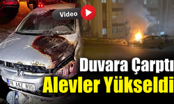 İstinat duvarına çarpan aracın motoru alev aldı