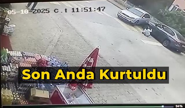 Aracın altında kalmaktan son anda kurtuldu